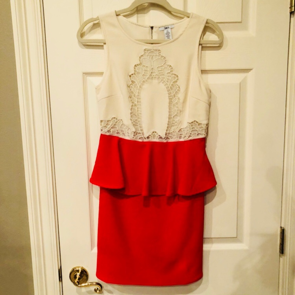 White and orange peplum dress